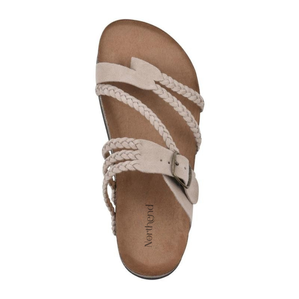 Side profile of a Kaelen cork sandal, highlighting the natural arch support and textured cork footbed.