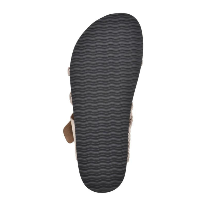 Pair of Kaelen braided cork sandals, styled on a wooden deck, emphasizing their relaxed summer vibe.