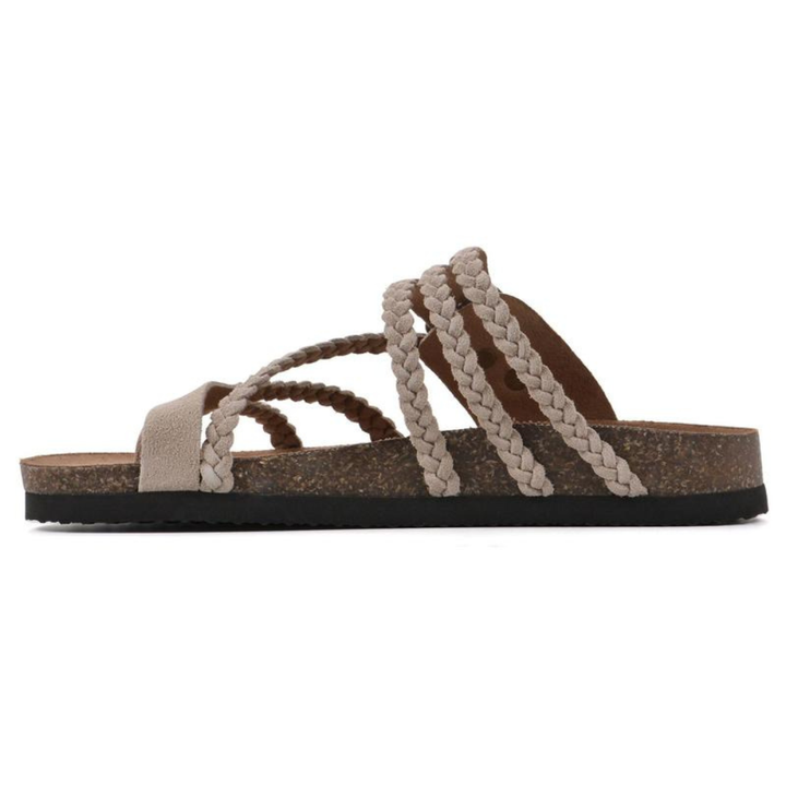 Detailed shot of the braided straps on the Kaelen sandals, showing the quality of the synthetic leather material.